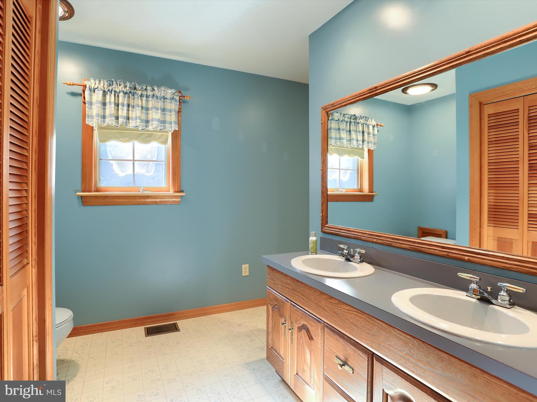 333 Mauger Path Road Port Royal, PA 17082 - Photo 37 of 58 a bathroom with a sink and a mirror
