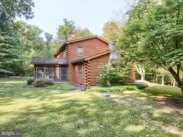 a view of outdoor space with deck and wooden floor