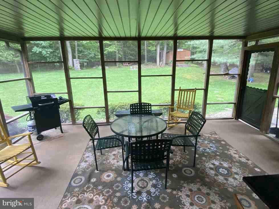 333 Mauger Path Road Port Royal, PA 17082 - Photo 52 of 58 a view of a patio with a table chairs and a table
