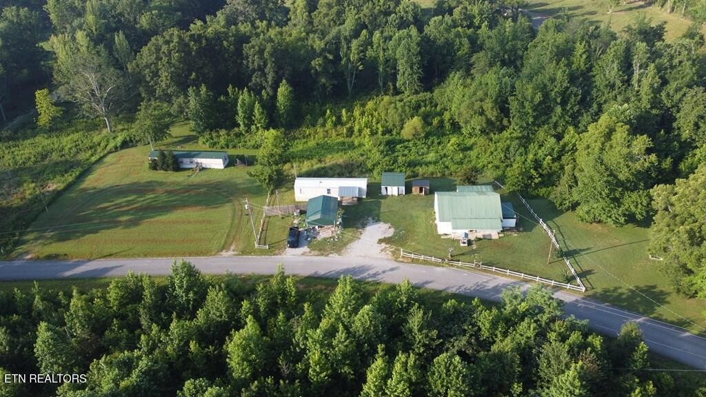 7224 Thomas Twin Oaks Road Baxter, TN 38544 - Photo 13 of 26 an aerial view of a house with a yard