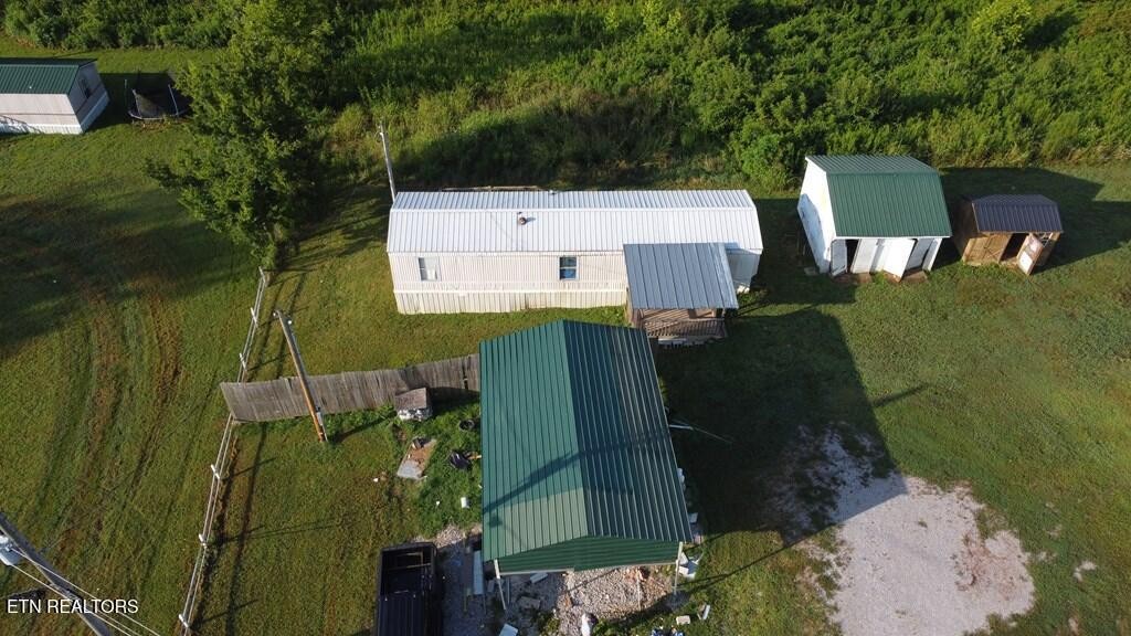 7224 Thomas Twin Oaks Road Baxter, TN 38544 - Photo 26 of 26 an aerial view of a house with pool outdoor seating and yard