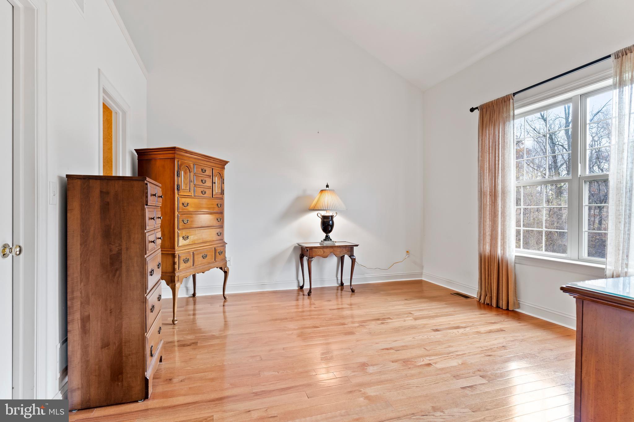 1920 Roxbury Court Mechanicsburg, PA 17055 - Photo 18 of 34 a dining room with wooden floor and a window