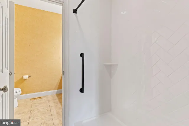 a view of a livingroom with wooden floor