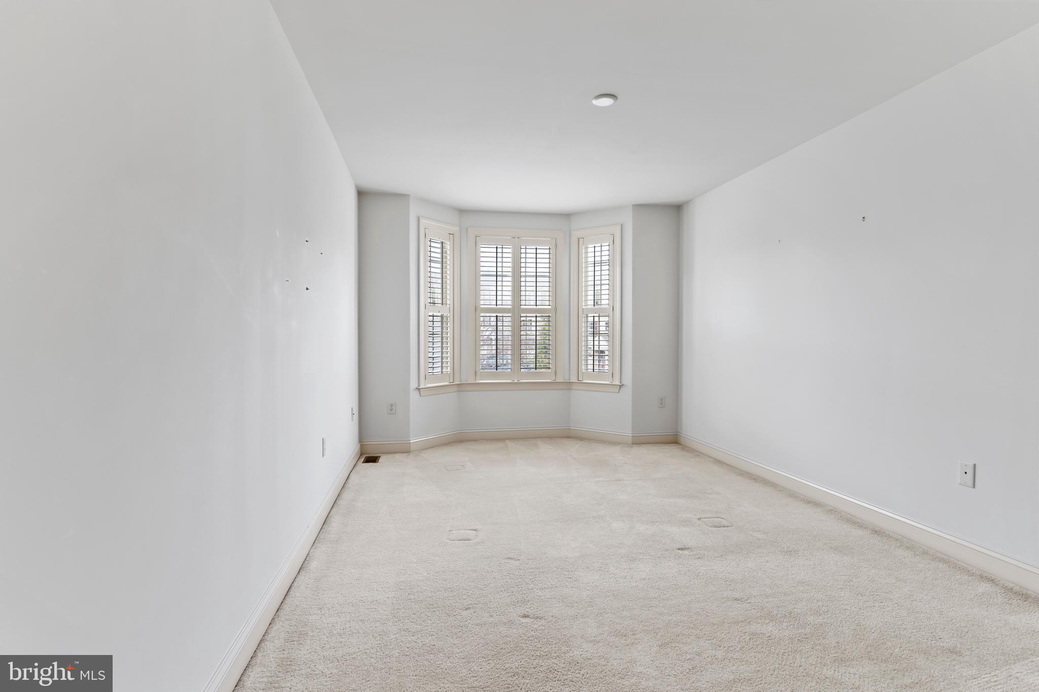 1920 Roxbury Court Mechanicsburg, PA 17055 - Photo 26 of 34 an empty room with windows