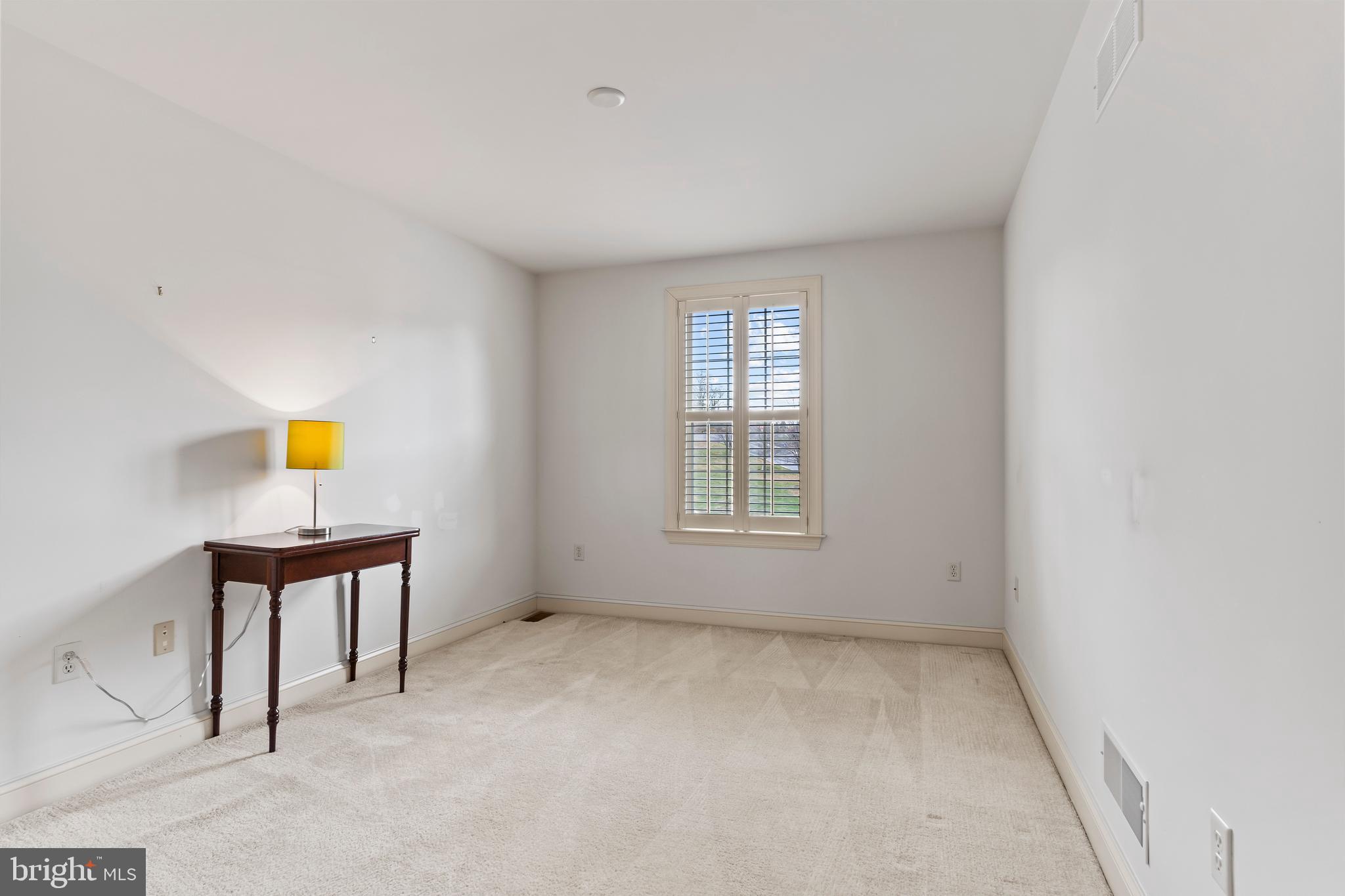 1920 Roxbury Court Mechanicsburg, PA 17055 - Photo 28 of 34 an empty room with windows and bed