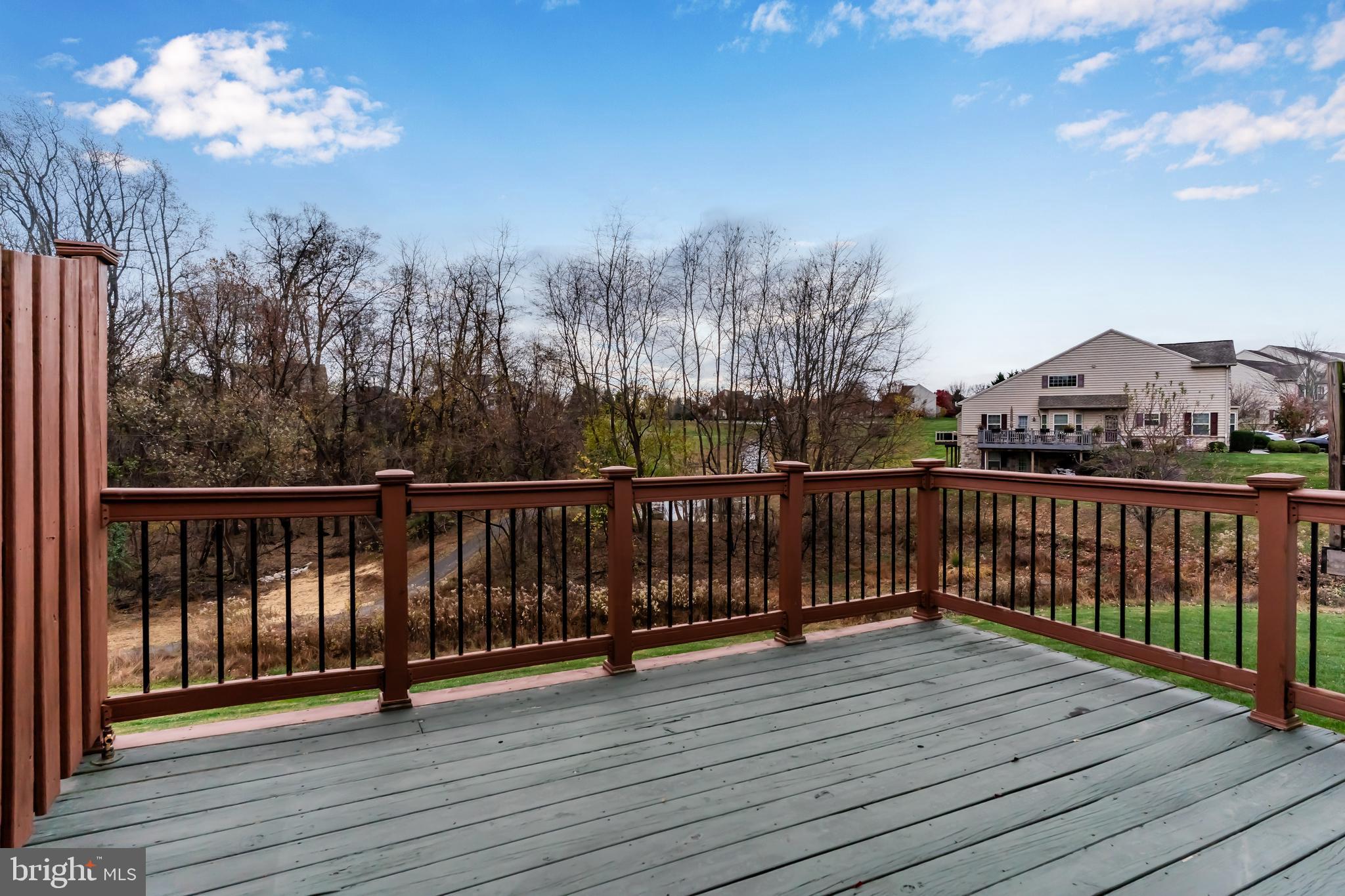 1920 Roxbury Court Mechanicsburg, PA 17055 - Photo 31 of 34 a view of balcony with wooden floor and fence