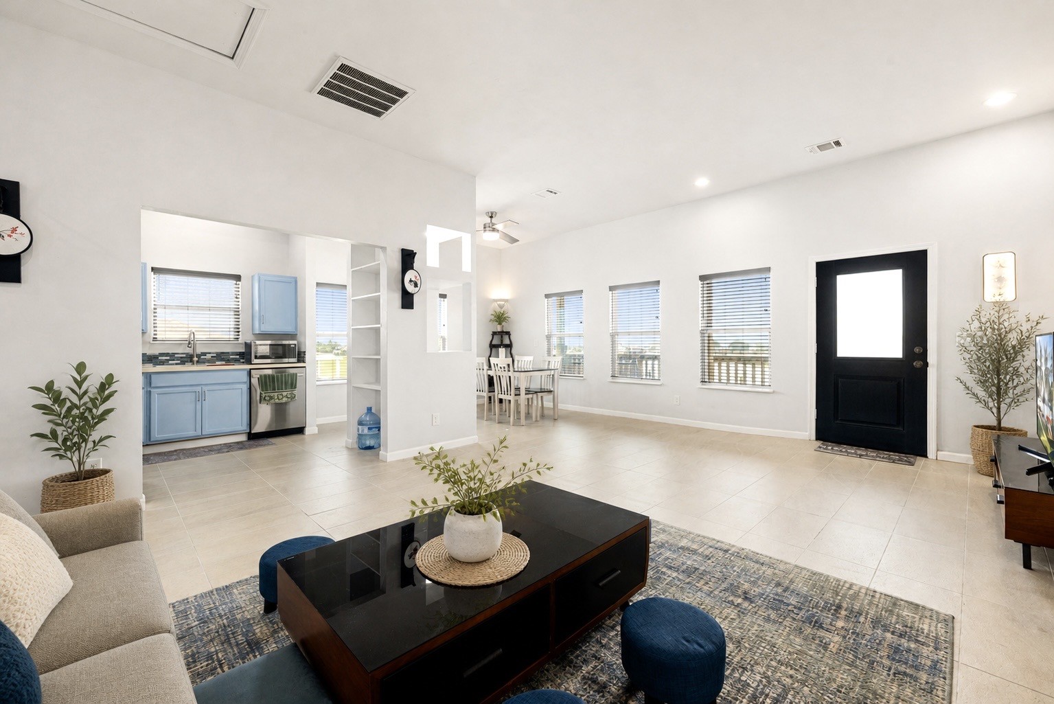167 Garth Street Freeport, TX 77541 - Photo 8 of 34 a living room with furniture kitchen view and a wooden floor