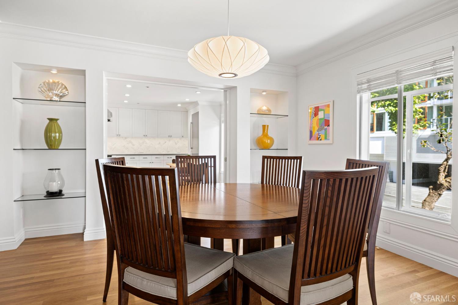 2145 Franklin Street, Unit 1 San Francisco, CA 94109 - Photo 13 of 46 a view of a dining room with furniture window and wooden floor