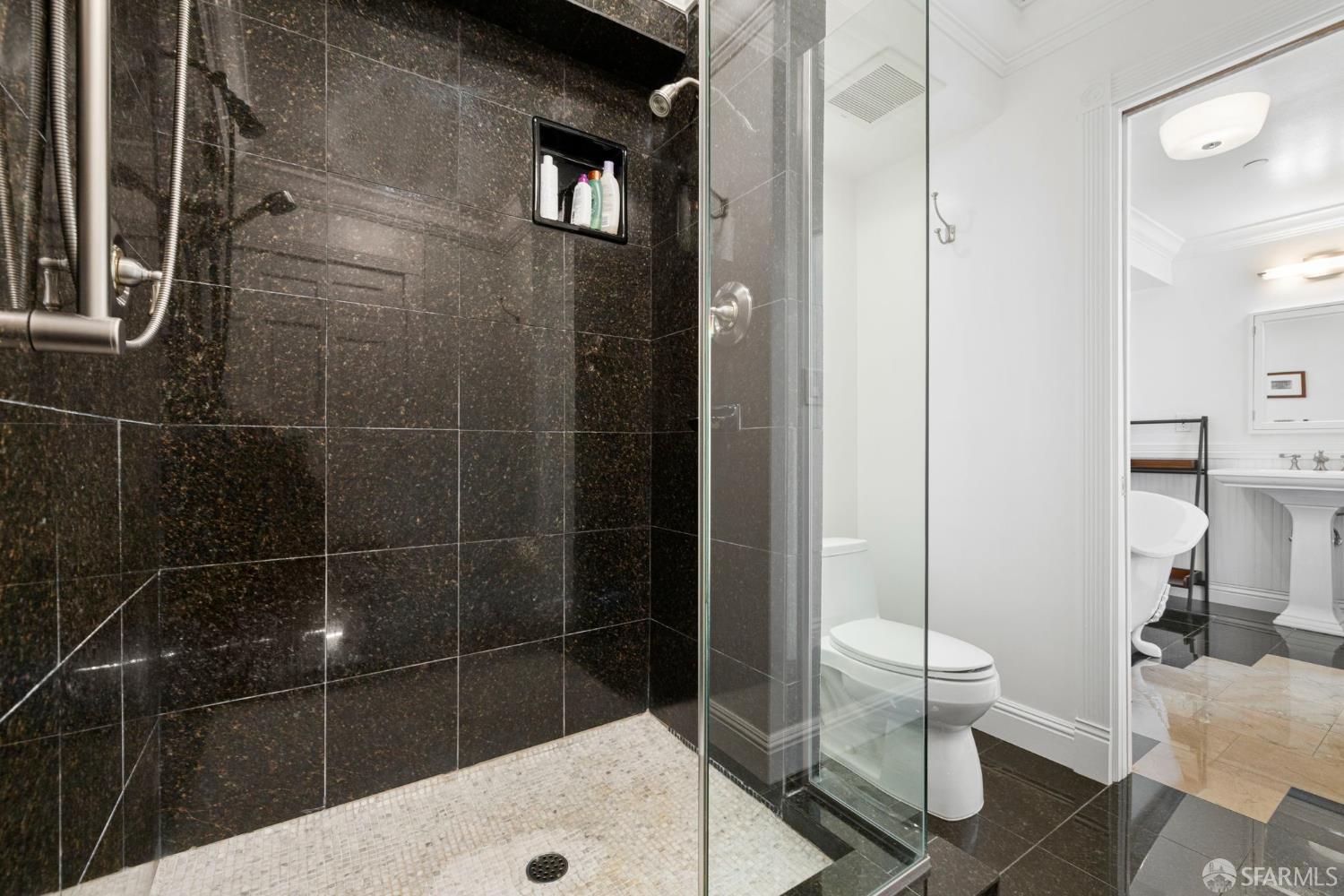 2145 Franklin Street, Unit 1 San Francisco, CA 94109 - Photo 30 of 46 a bathroom with a sink toilet and shower