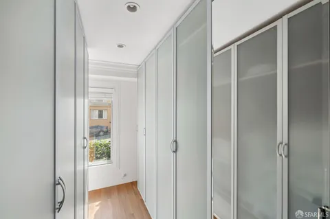 a view of entryway with wooden floor