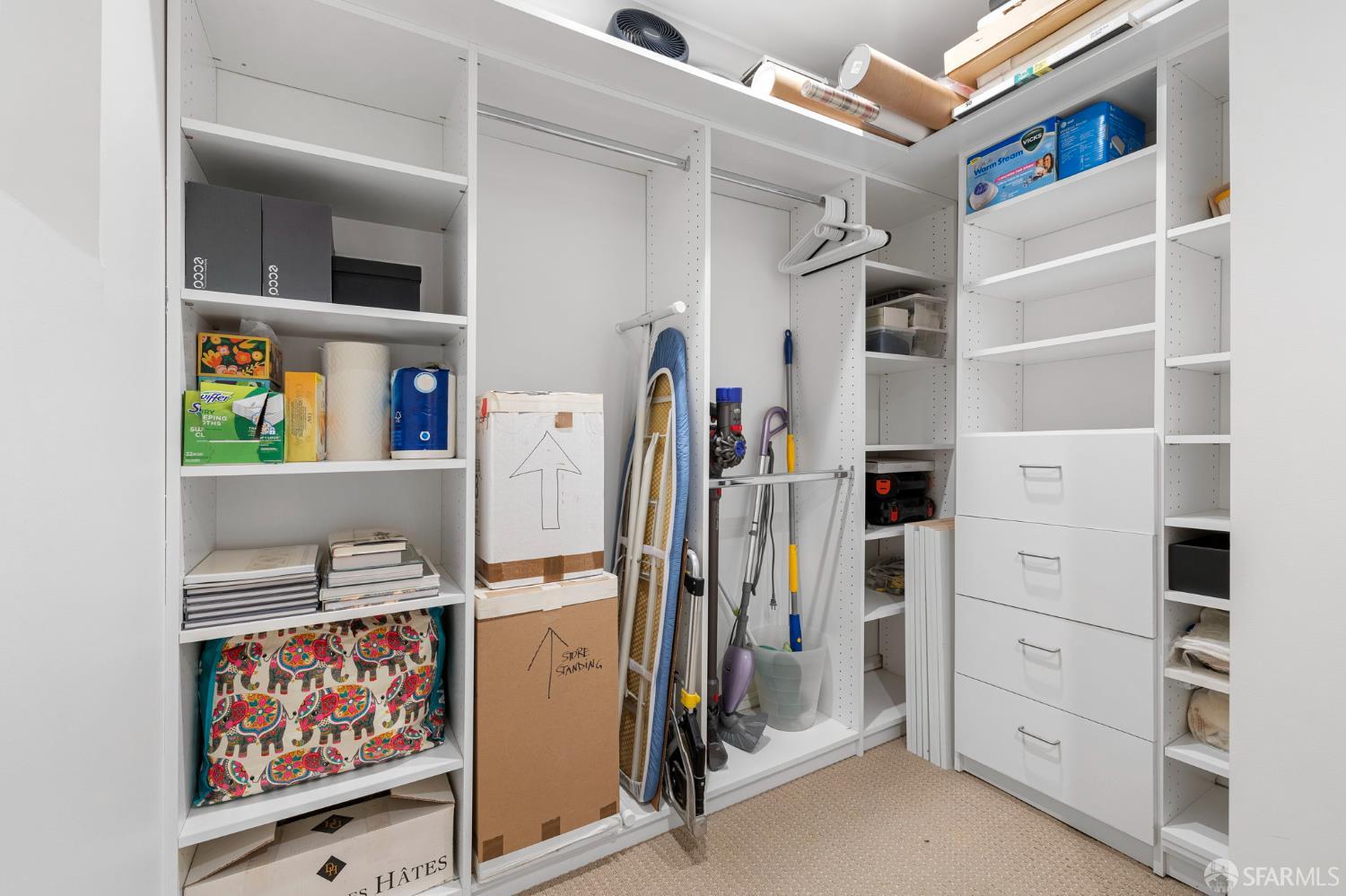 2145 Franklin Street, Unit 1 San Francisco, CA 94109 - Photo 41 of 46 a view of walk in closet with clothes and shoes