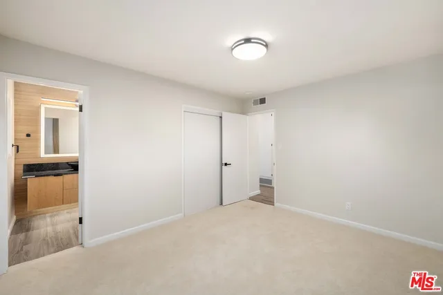 a view of a room with an empty space