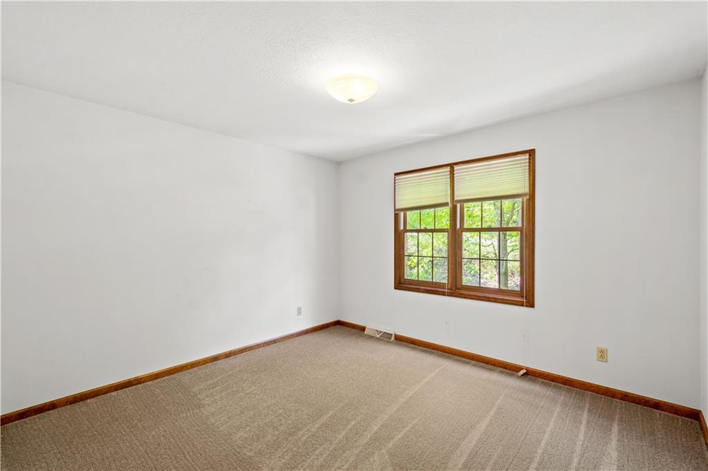 203 Oak Leaf Drive Mars, PA 16046 - Photo 19 of 25 an empty room with a window