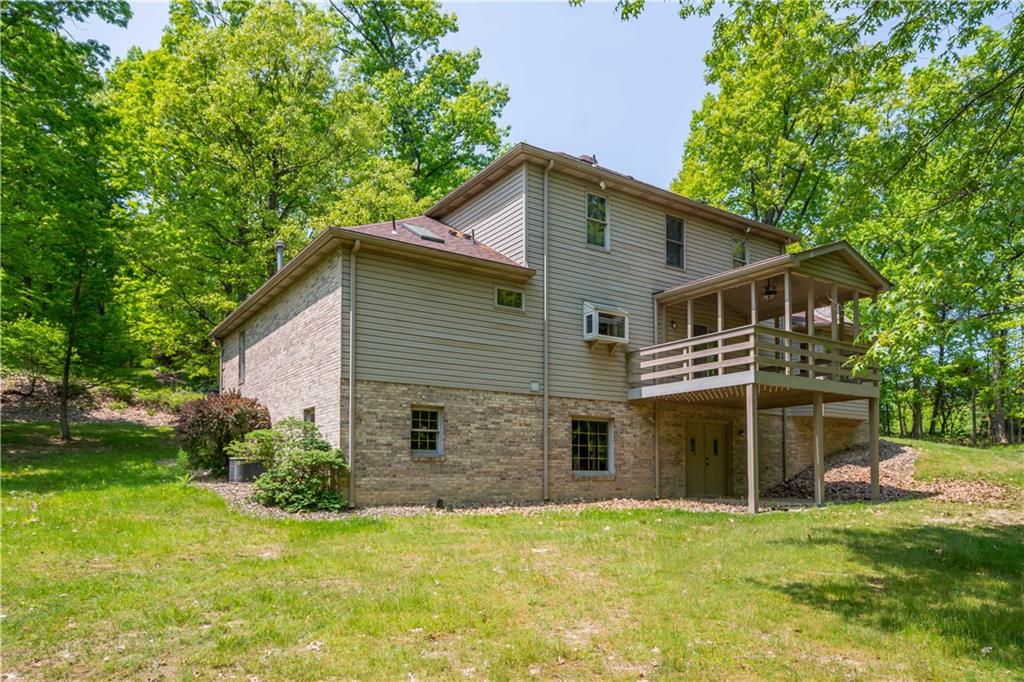 203 Oak Leaf Drive Mars, PA 16046 - Photo 23 of 25 a view of a house with a yard