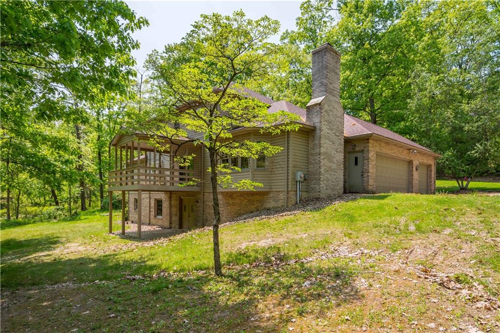 203 Oak Leaf Drive Mars, PA 16046 - Photo 24 of 25 a backyard of a house with lots of green space