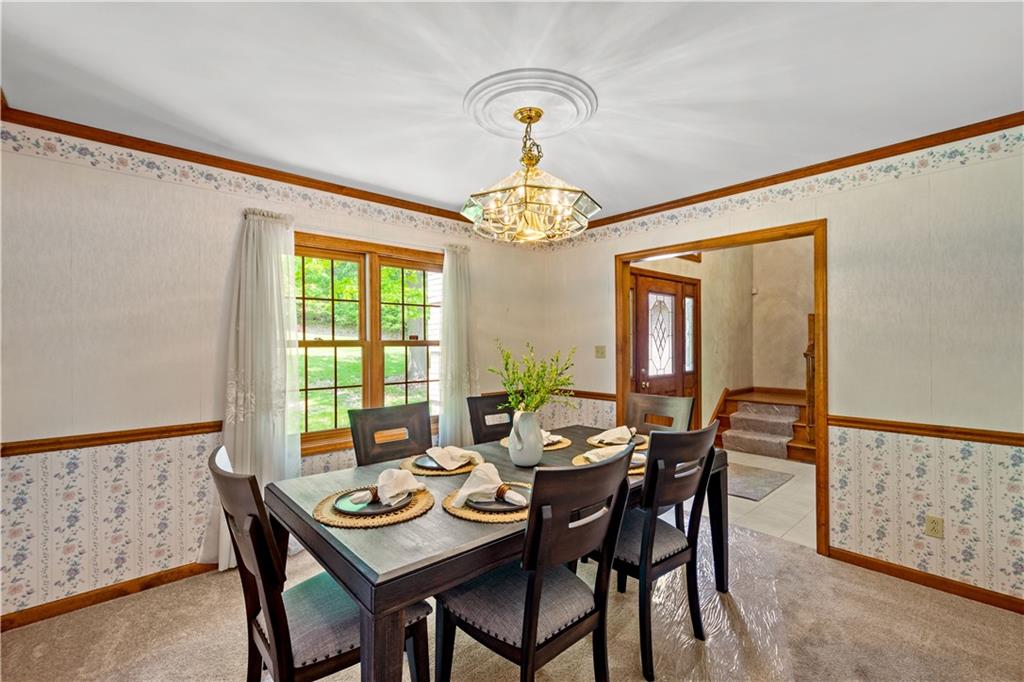 203 Oak Leaf Drive Mars, PA 16046 - Photo 3 of 25 a dining room with furniture and window