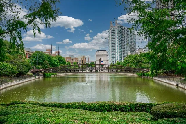 a view of a lake with a city