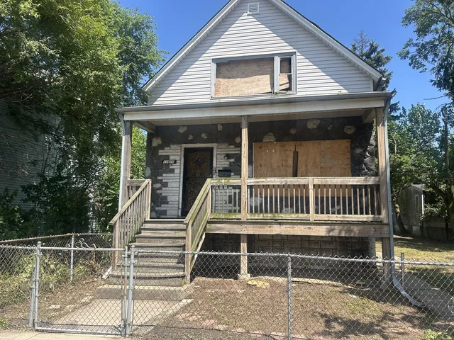 a front view of a house with balcony