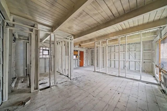 a view of a porch with a glass door