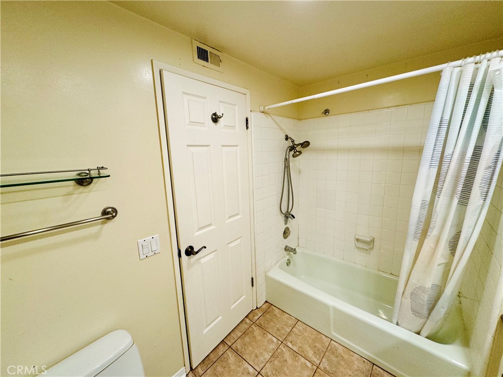 3632 Myrtle Street Irvine, CA 92606 - Photo 22 of 40 a bathroom with a shower and a toilet