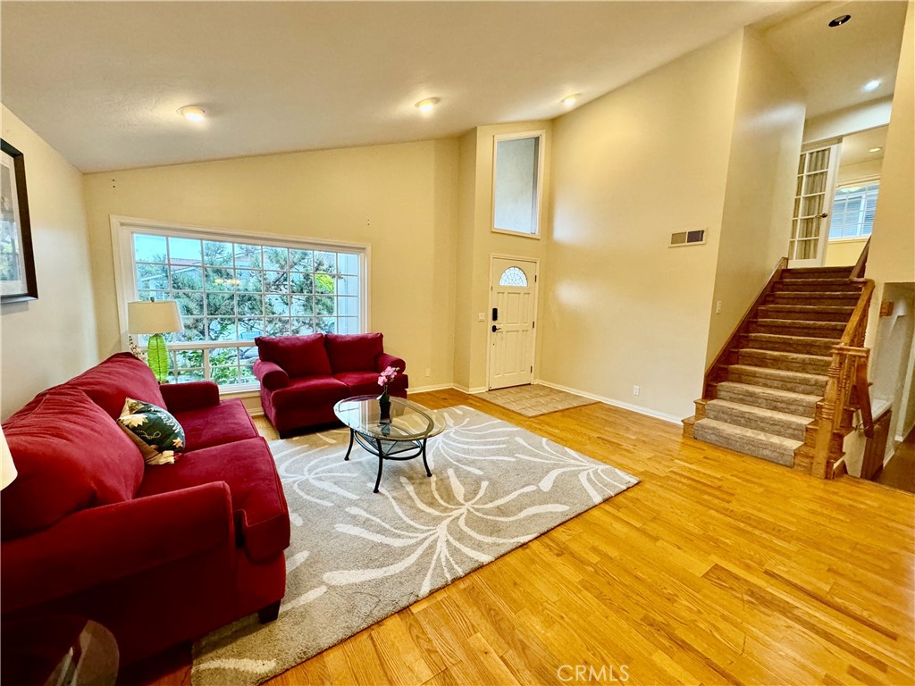 3632 Myrtle Street Irvine, CA 92606 - Photo 3 of 40 a theatre with furniture and wooden floor