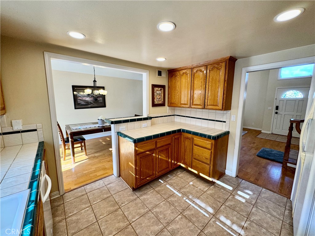 3632 Myrtle Street Irvine, CA 92606 - Photo 9 of 40 a kitchen with stainless steel appliances granite countertop a stove a sink and a microwave