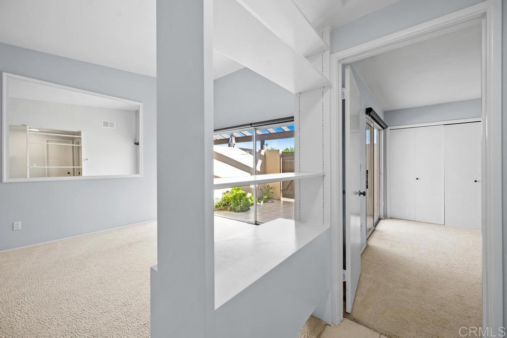 12228 Rancho Bernardo Road, Unit B San Diego, CA 92128 - Photo 14 of 35 a view of hallway with livingroom