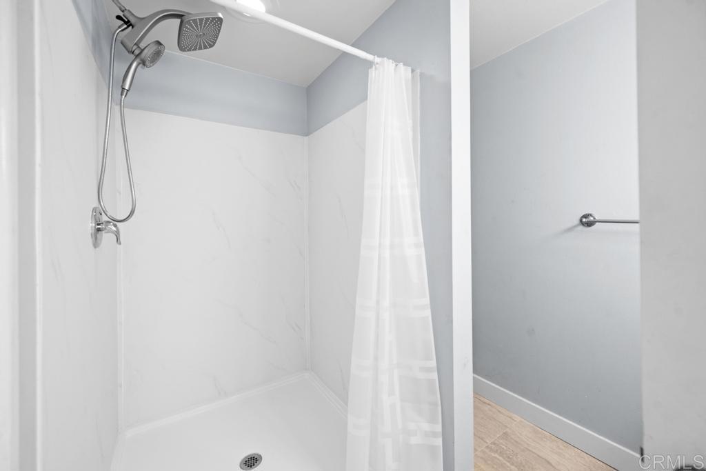 12228 Rancho Bernardo Road, Unit B San Diego, CA 92128 - Photo 17 of 35 a bathroom with a shower