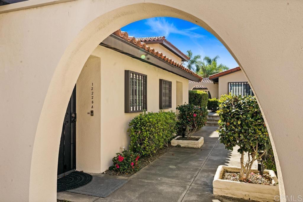 12228 Rancho Bernardo Road, Unit B San Diego, CA 92128 - Photo 24 of 35 a view of a house with a yard