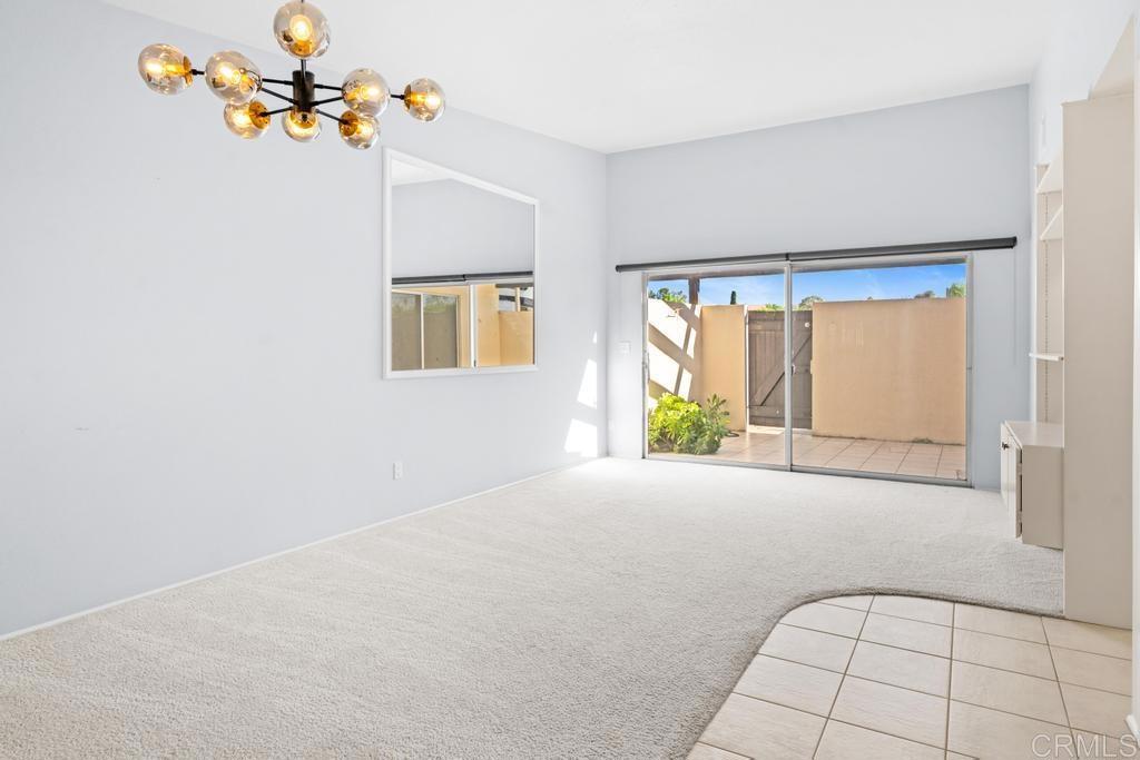 12228 Rancho Bernardo Road, Unit B San Diego, CA 92128 - Photo 8 of 35 a view of an empty room with a window