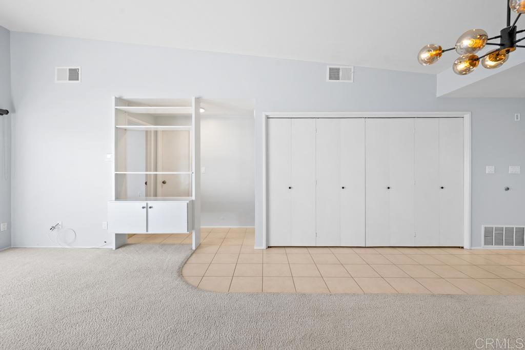 12228 Rancho Bernardo Road, Unit B San Diego, CA 92128 - Photo 9 of 35 a view of an empty room