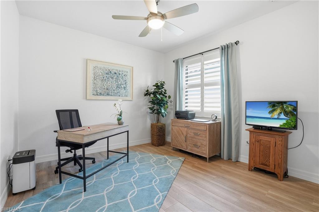 3022 Aviamar Circle Naples, FL 34114 - Photo 24 of 49 a room with furniture and a window