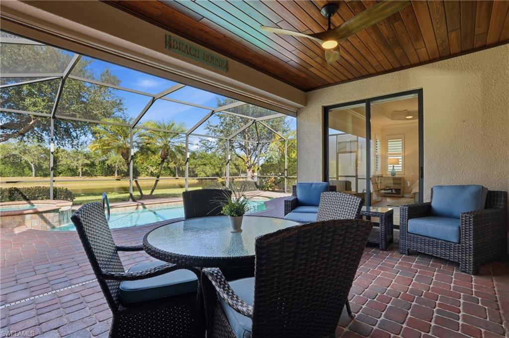 3022 Aviamar Circle Naples, FL 34114 - Photo 30 of 49 a outdoor space with patio couch and wooden floor