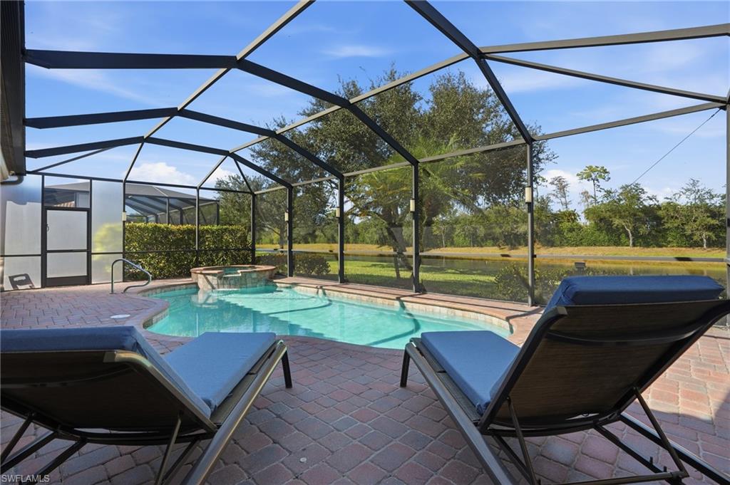 3022 Aviamar Circle Naples, FL 34114 - Photo 32 of 49 a view of a backyard with sitting area