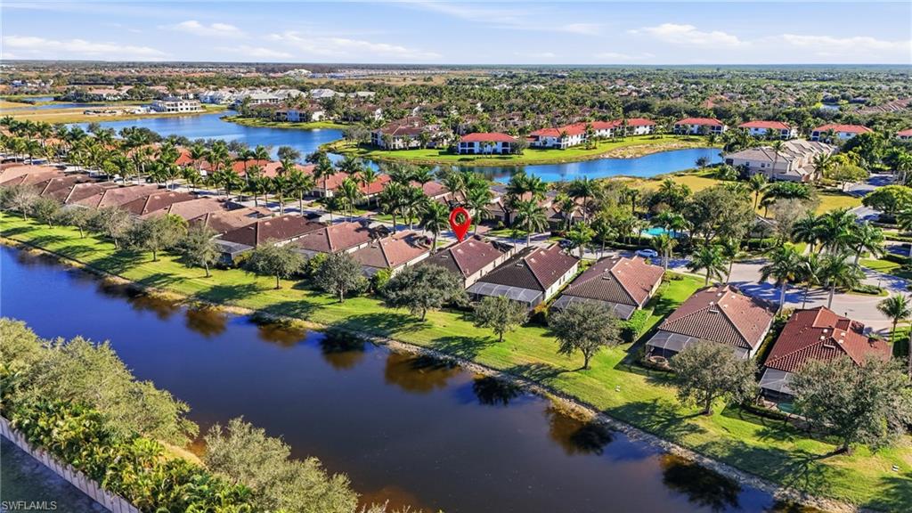 3022 Aviamar Circle Naples, FL 34114 - Photo 34 of 49 an aerial view of a houses with a lake view