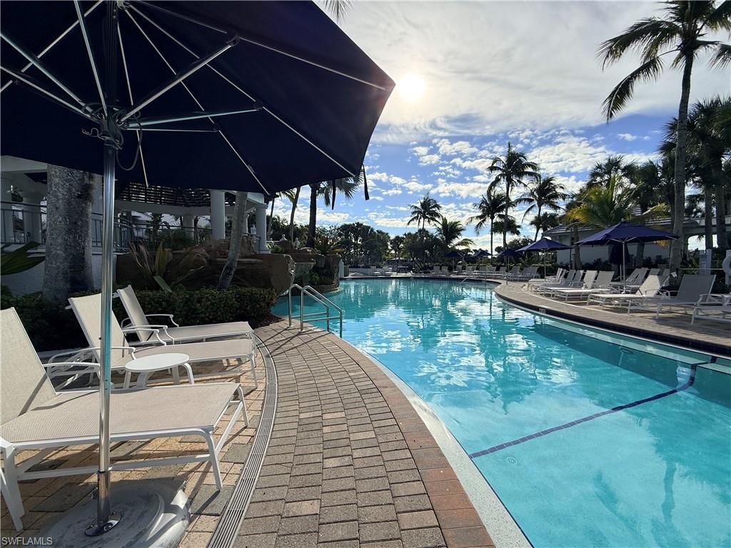 3022 Aviamar Circle Naples, FL 34114 - Photo 43 of 49 a view of a swimming pool with a patio