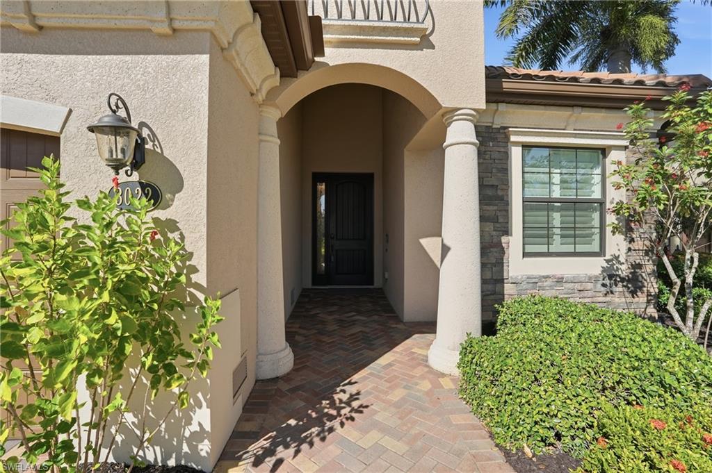 3022 Aviamar Circle Naples, FL 34114 - Photo 5 of 49 a view of a house with potted plants
