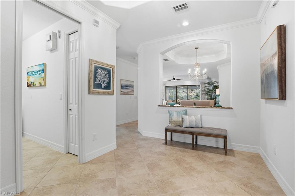 3022 Aviamar Circle Naples, FL 34114 - Photo 7 of 49 a view of a livingroom with furniture and ceiling fan