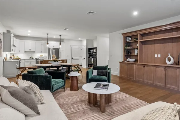 a living room with a couch and a table