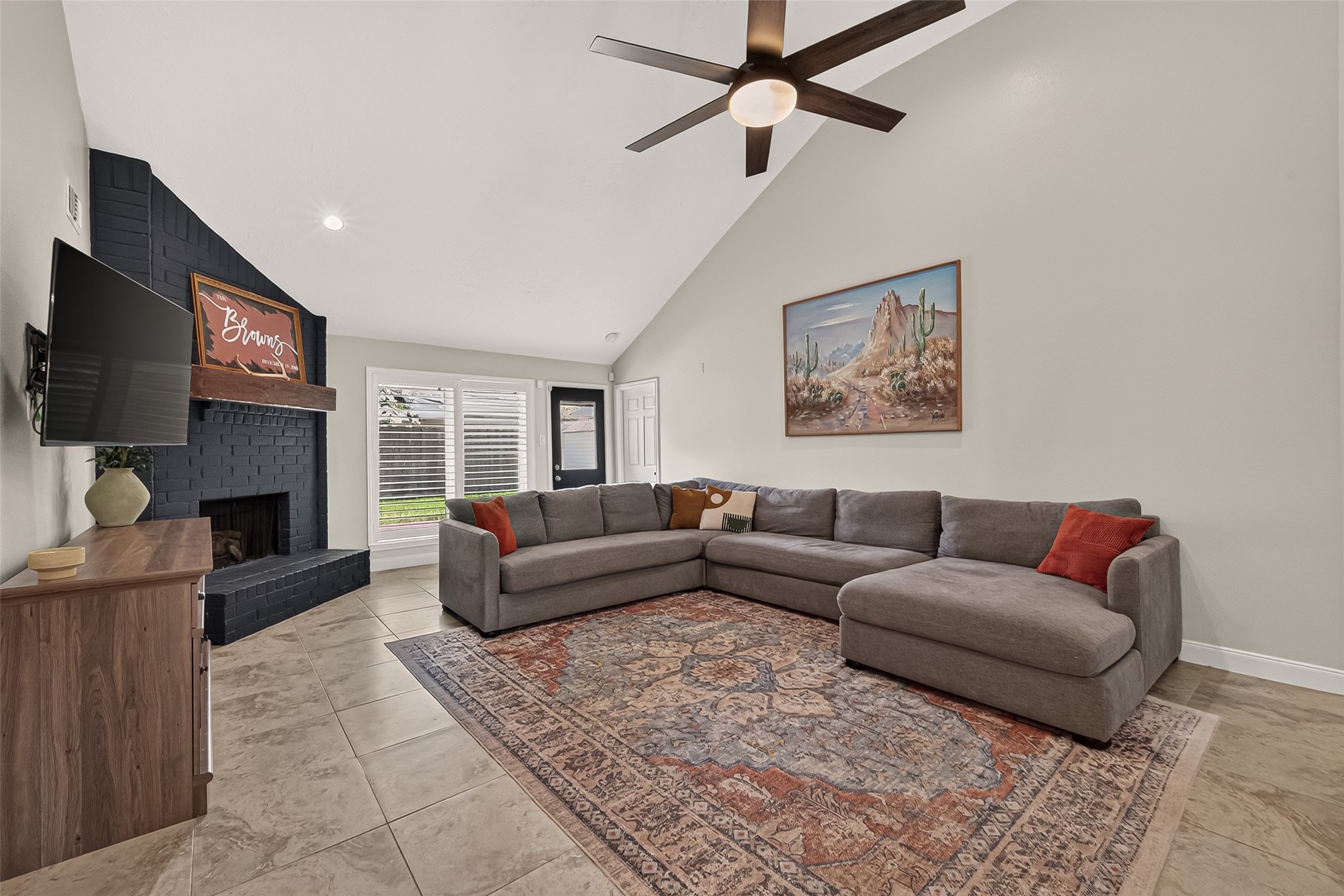22939 Indian Ridge Drive Katy, TX 77450 - Photo 4 of 35 Large living area with plantation shutters, fireplace, and wet bar