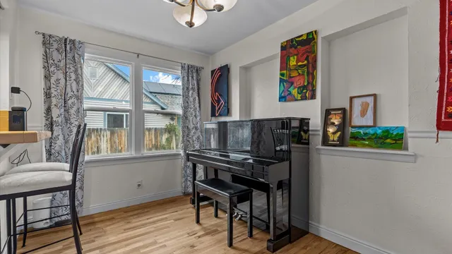 a kitchen that has a table and chairs in it