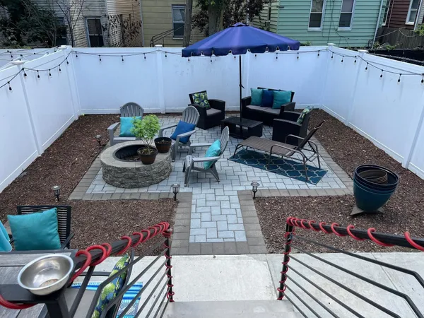 a view of a patio with furniture