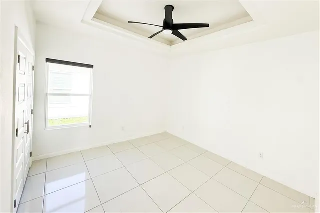 a bath room with a sink and a mirror