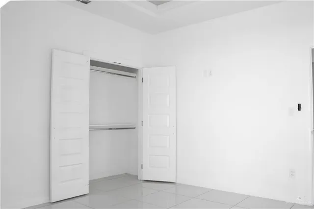 a view of a room with a window