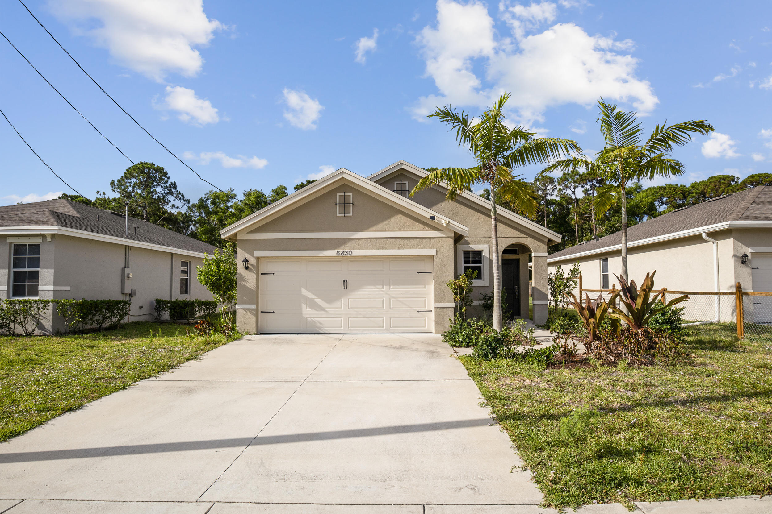 6830 Mitchell Street Jupiter, FL 33458 - Photo 1 of 22 FRONT OF THE HOME