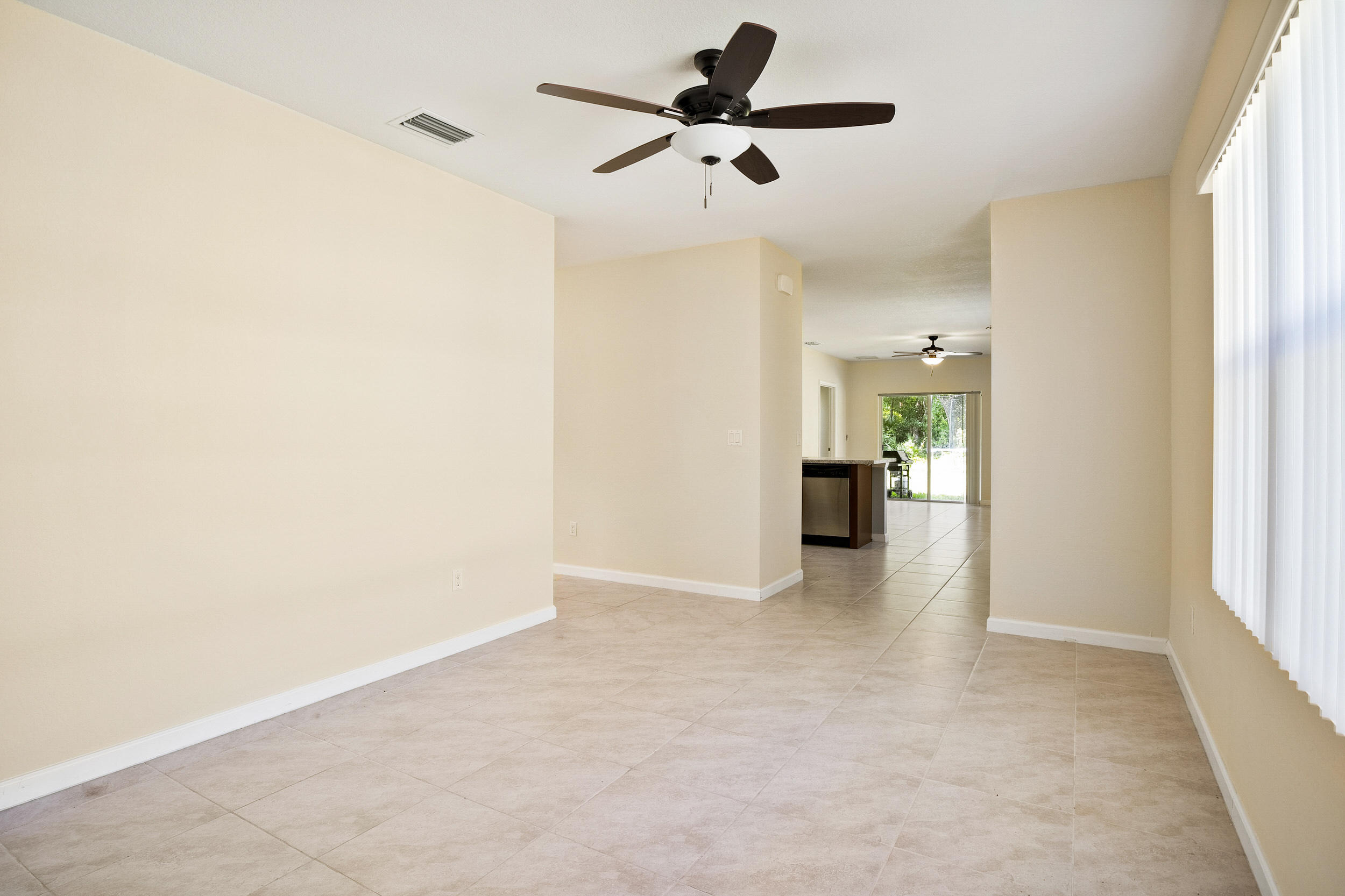 6830 Mitchell Street Jupiter, FL 33458 - Photo 3 of 22 ENTRANCE /LIVING ROOM