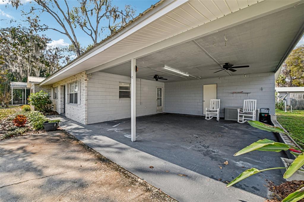 56305 Redbud Road Astor, FL 32102 - Photo 8 of 32 a view of a house with backyard