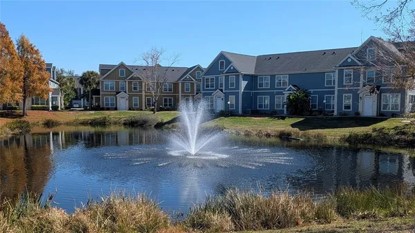 a view of a lake with a building in the background