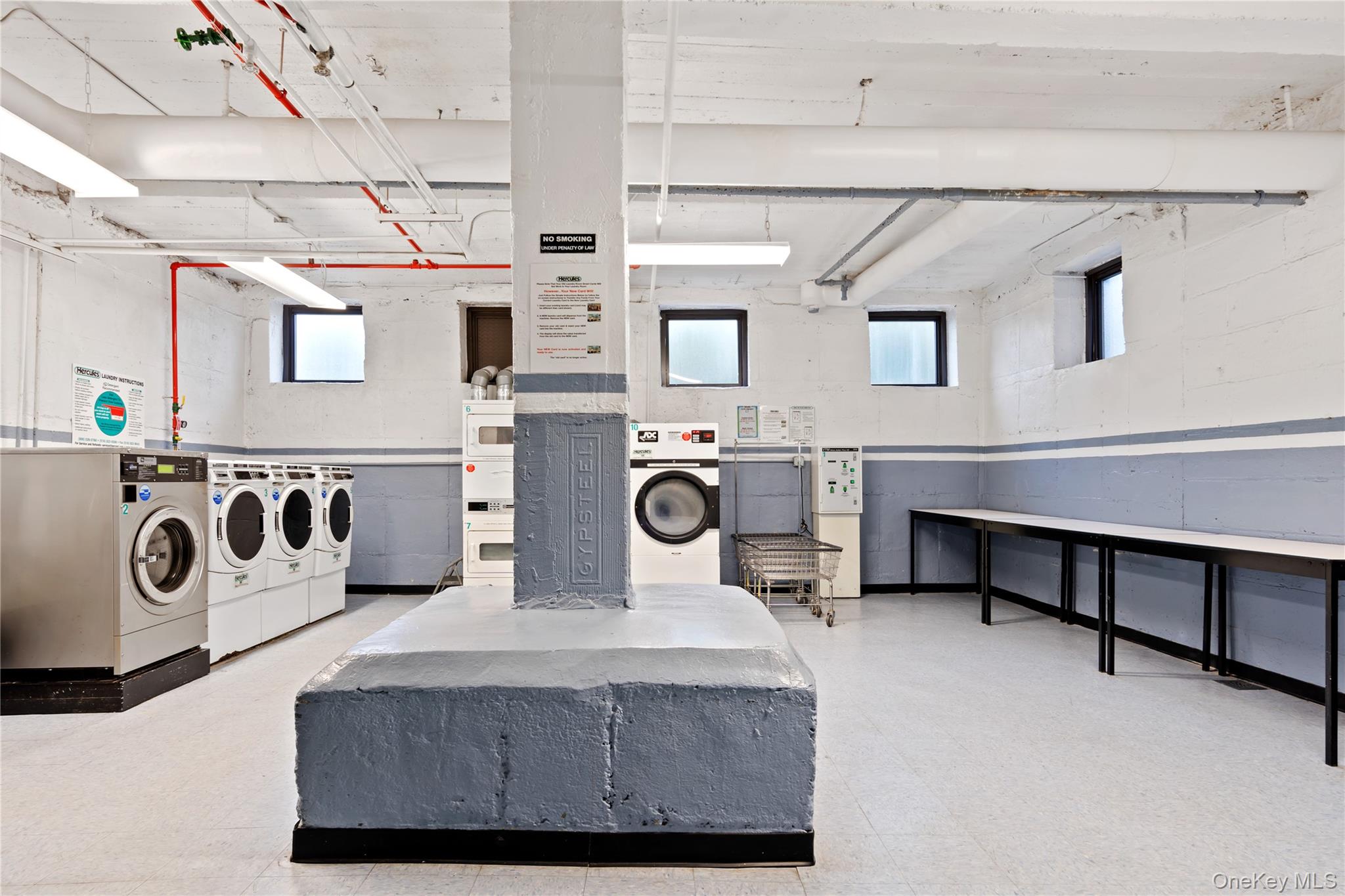 76-66 Austin Street, Unit 4B Queens, NY 11375 - Photo 8 of 12 Community laundry featuring washer and dryer