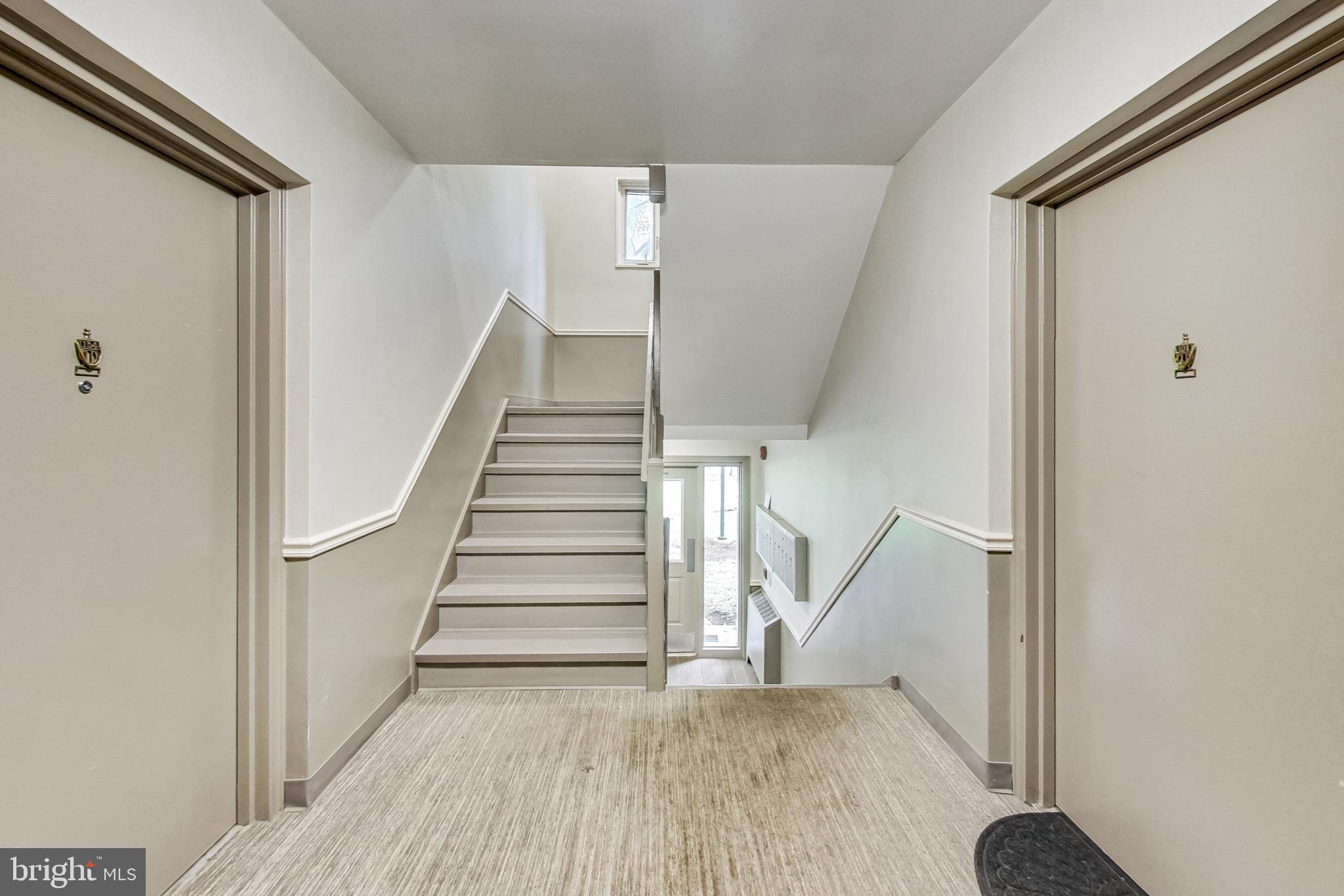 10501 Montrose Avenue, Unit 103 Bethesda, MD 20814 - Photo 9 of 27 a view of entryway with wooden floor